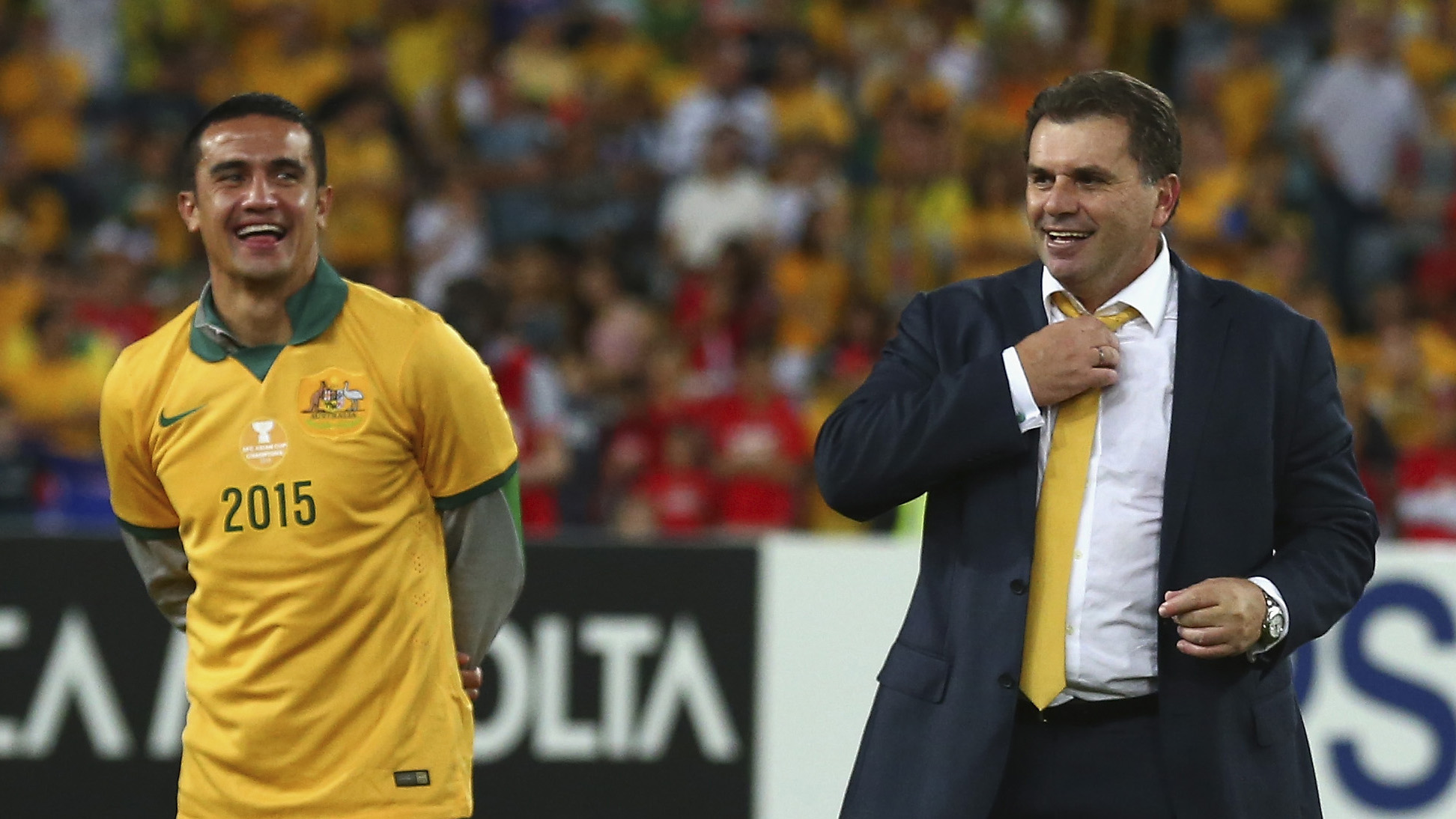 Ange Postecoglou shares a moment with Tim Cahill after winning the 2015 AFC Asian Cup Ange Postecoglou shares a moment with Tim Cahill after winning the 2015 AFC Asian Cup