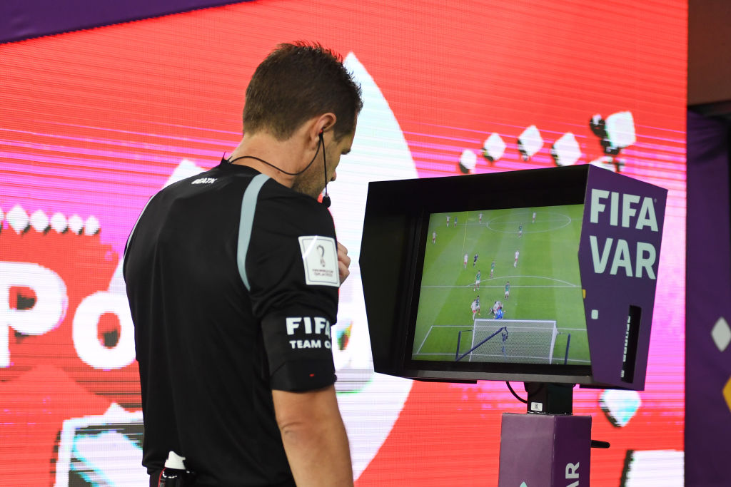 Referee Chris Beath watches the Video Assistant Referee screen to review the penalty incident during the FIFA World Cup Qatar 2022 Group C match between Mexico and Poland at Stadium 974 on November 22, 2022 in Doha, Qatar. (Photo by David Ramos - FIFA/FIF Referee Chris Beath watches the Video Assistant Referee screen to review the penalty incident during the FIFA World Cup Qatar 2022 Group C match between Mexico and Poland at Stadium 974 on November 22, 2022 in Doha, Qatar. (Photo by David Ramos - FIFA/FIFA via Getty Images)