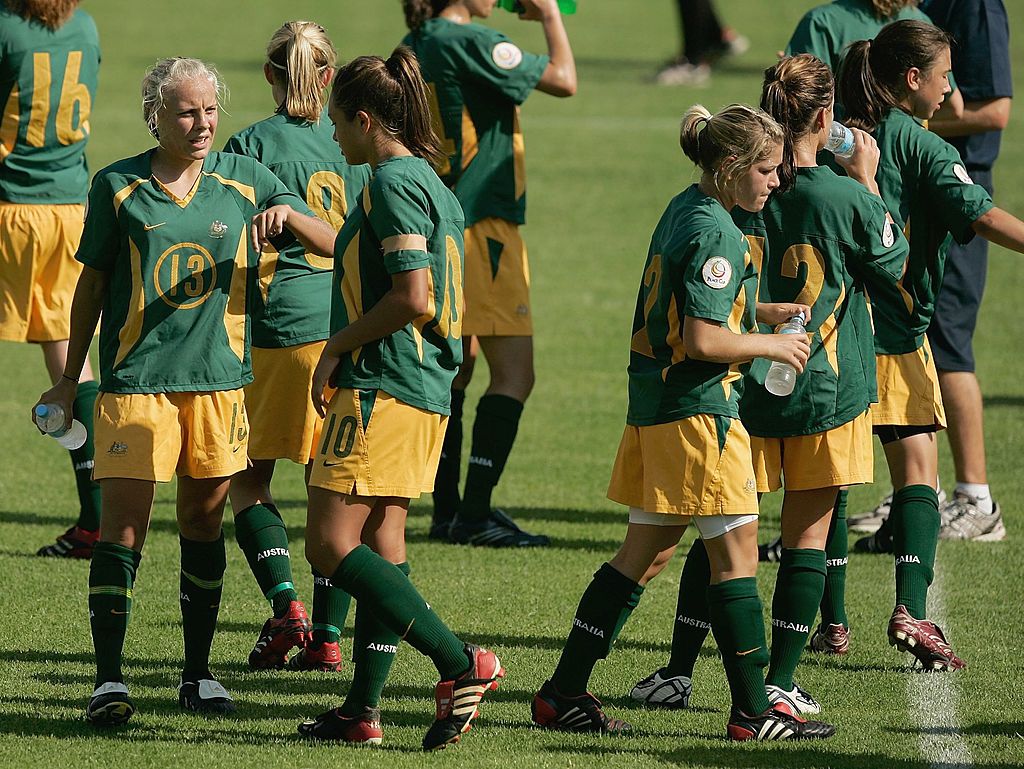 Tameka Yallop (L) talks tactics with Kyah Simon (C) during the 2007 Australian Youth Olympic Festival soccer match between Australia and South Korea at Valentines Sports Park January 17, 2007 in Sydney, Australia. (Photo by Corey Davis/Getty Images)
