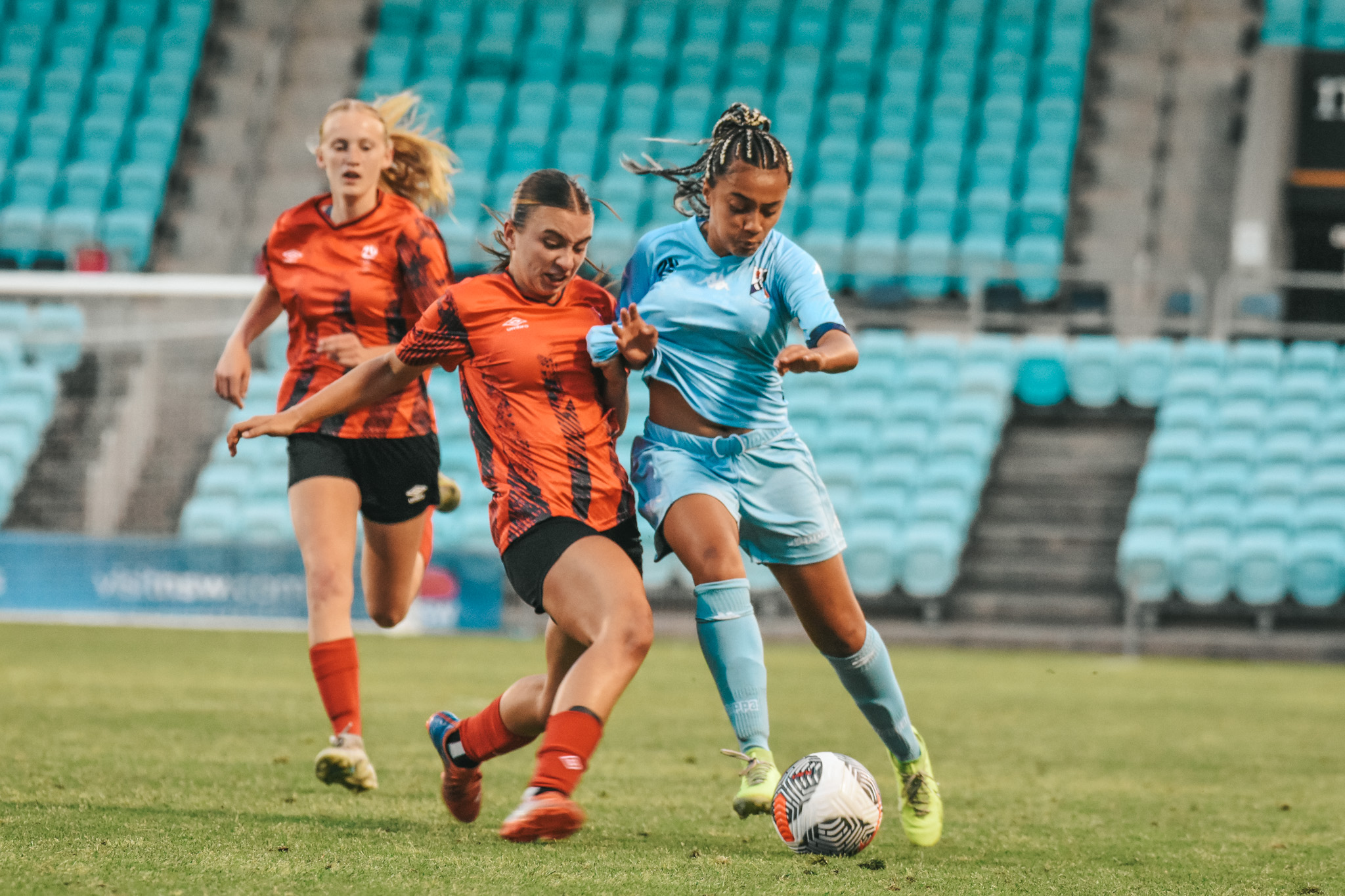 Northern NSW and NSW Metro battle for the ball during the National Youth Championships 2023 Girls' Tournament.