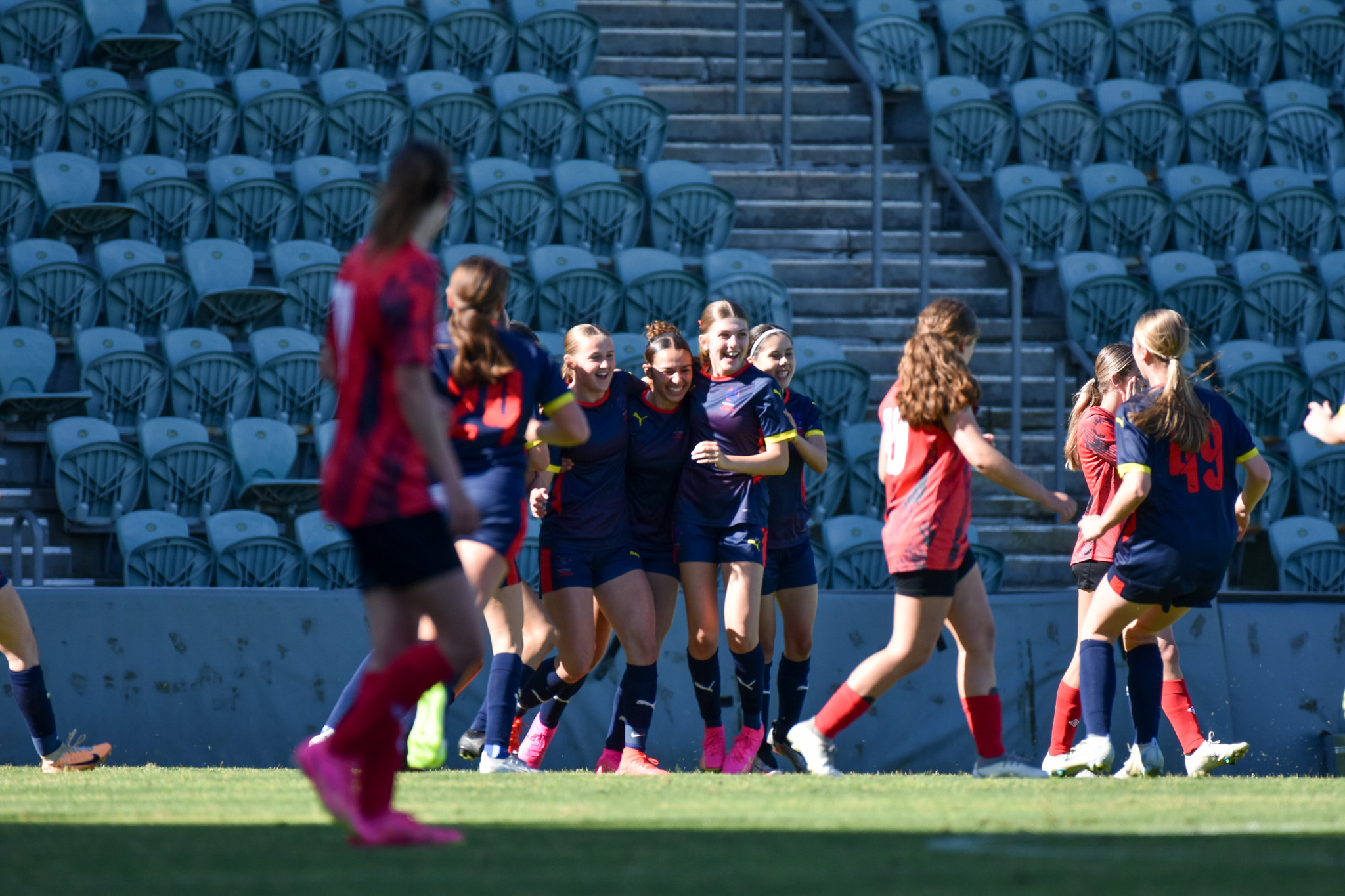 Annalise Simpson celebrates her goal for South Australia against Northern NSW during the Under 16 Pool B game during the National Youth Championships 2023 Girls' Tournament at WIN Stadium.