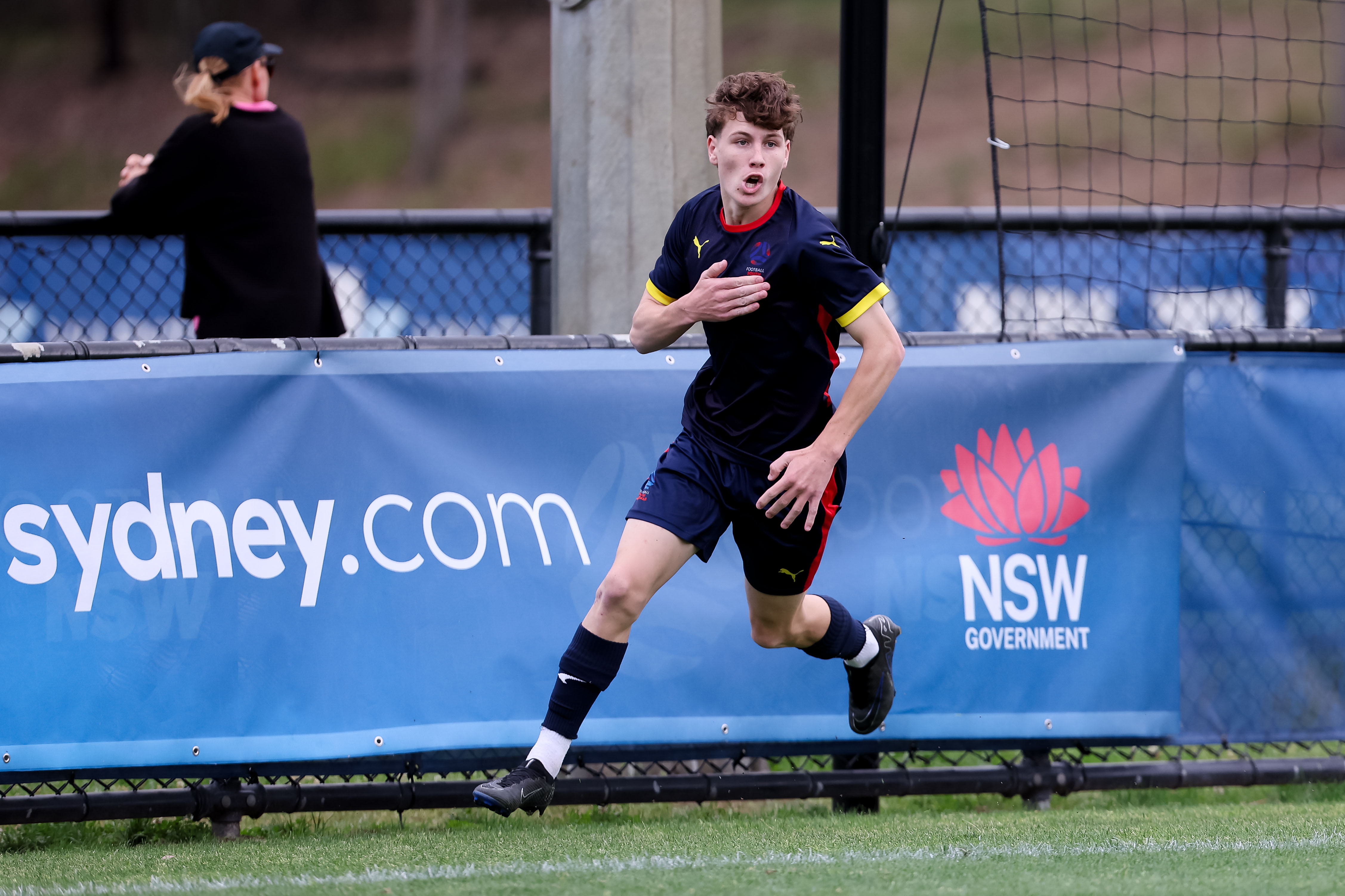 Harry Crawford celebrates his goal for South Australia against Queensland White.
