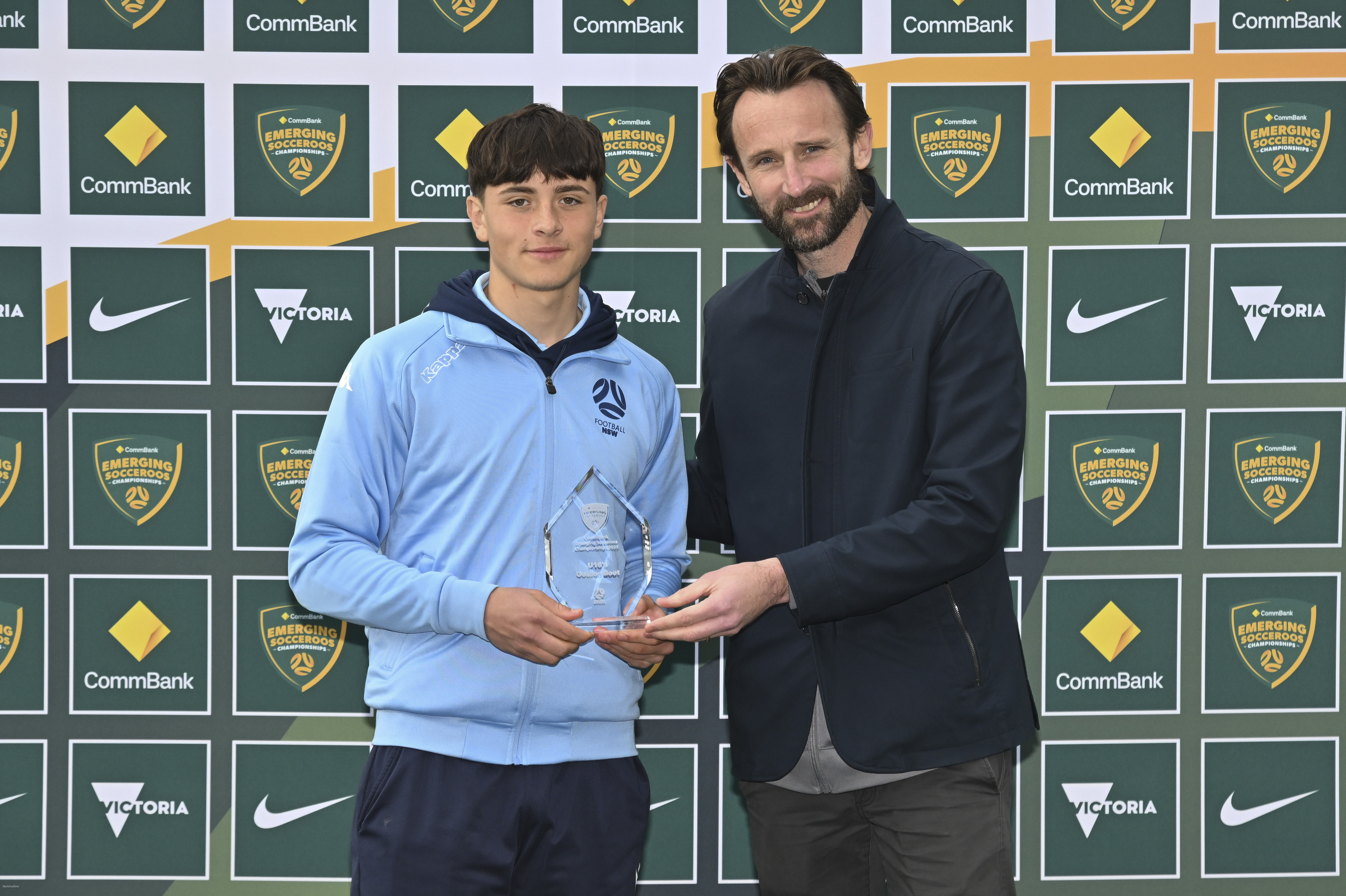 Orson Conroy (Football NSW) is handed the Golden Boot award for the Under 15 Age Group by Josh Kennedy. Photo Mark Avellino/Football Australia
