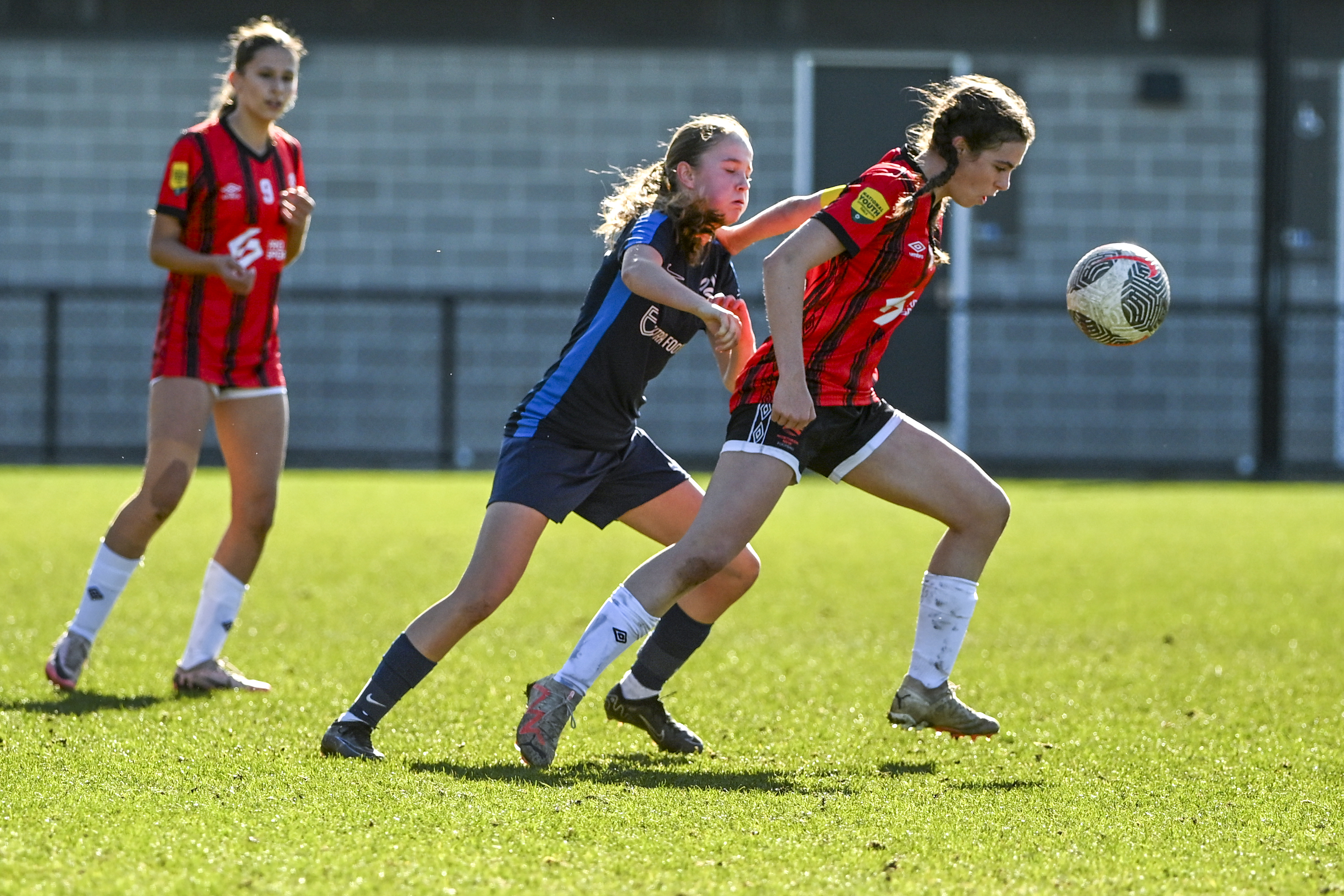 Northern NSW Football captain Laura Knipe pulls away from a Victorian defender. Photo Mark Avellino/Football Australia