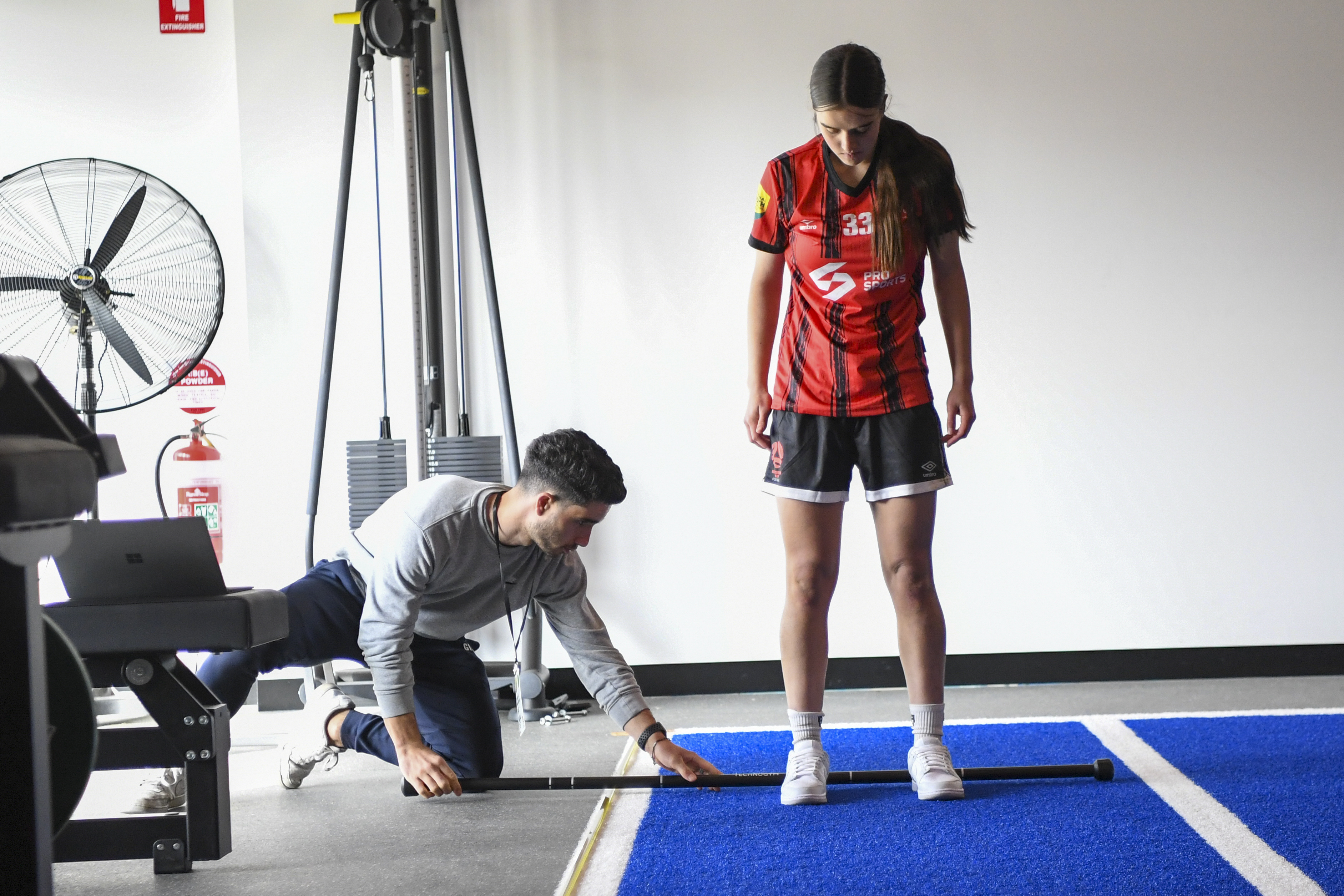 A Northern NSW Football player tests her standing broad jump