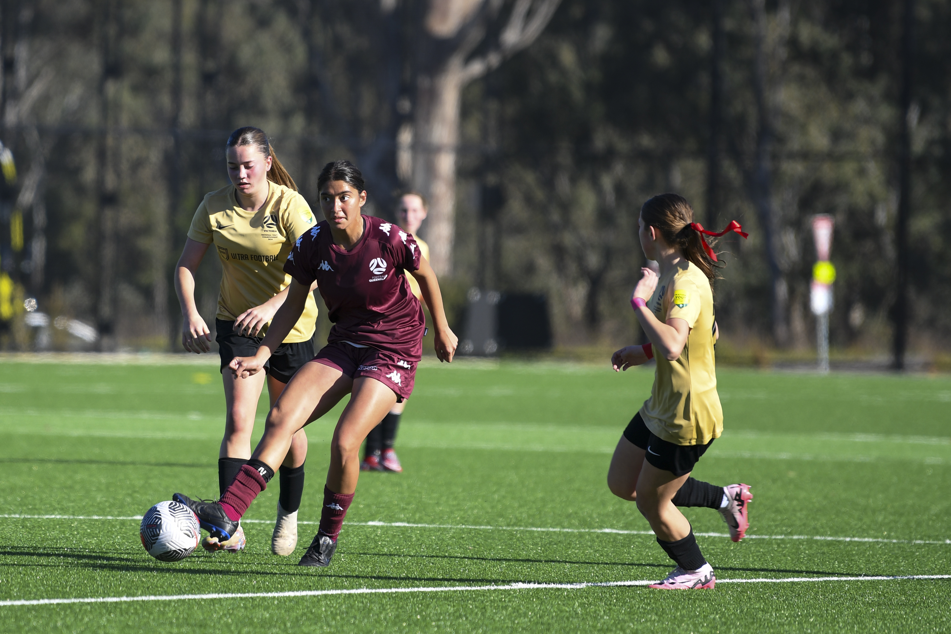 Queensland Under 15 Maroon side in action