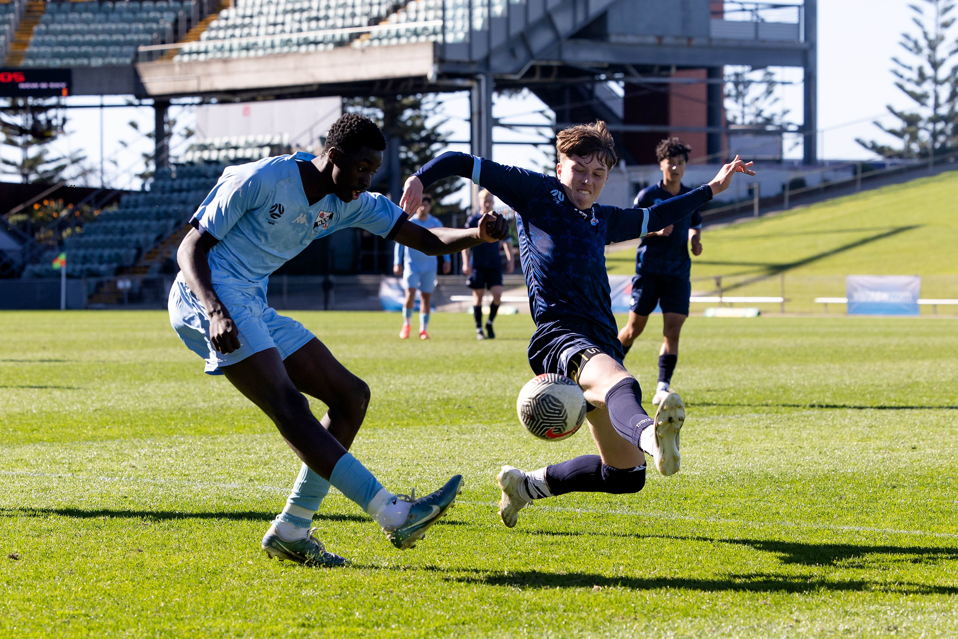 NSW Metro Navy and NSW Metro Sky battle for the ball