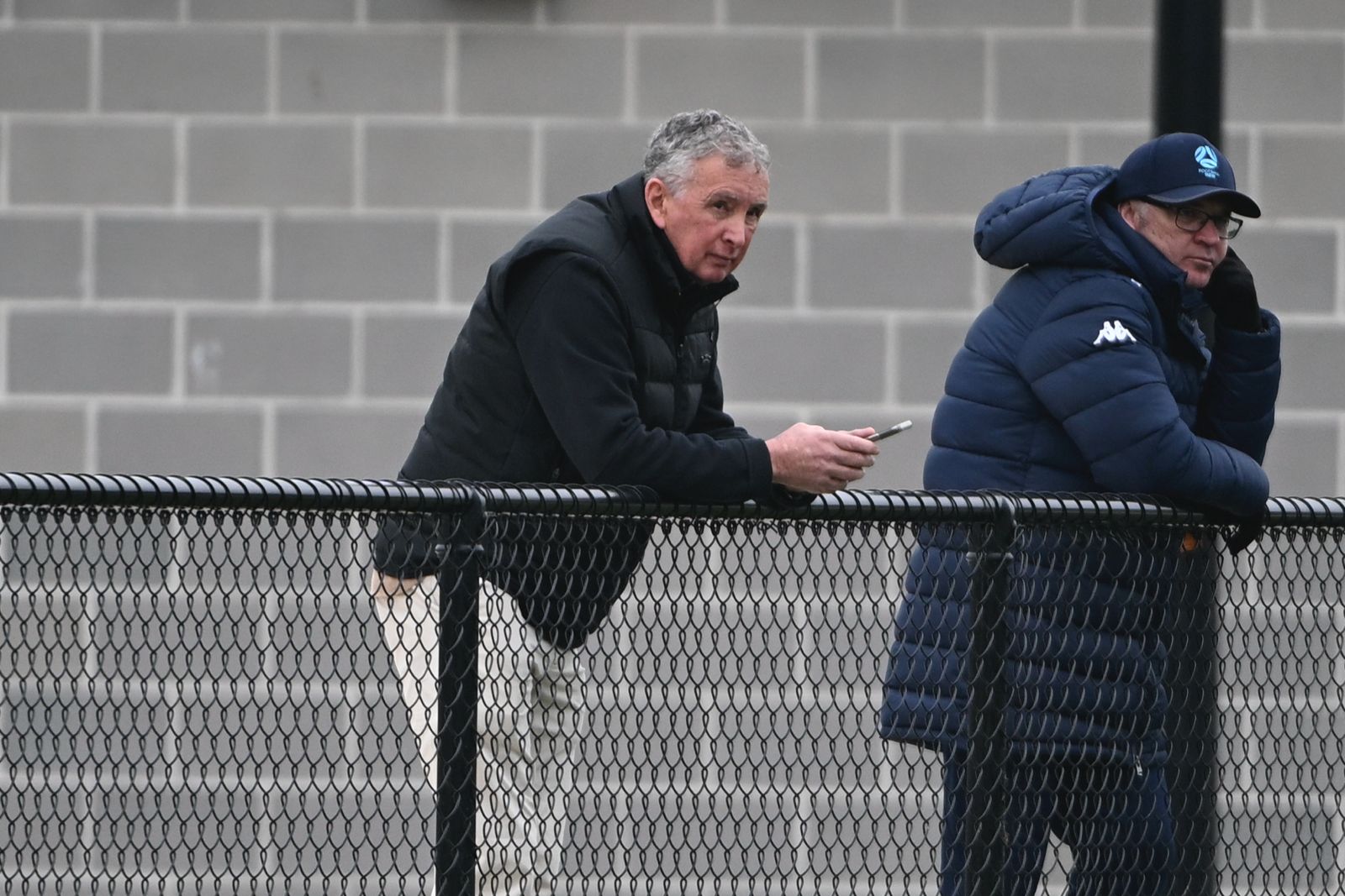 Ernie Merrick watches on