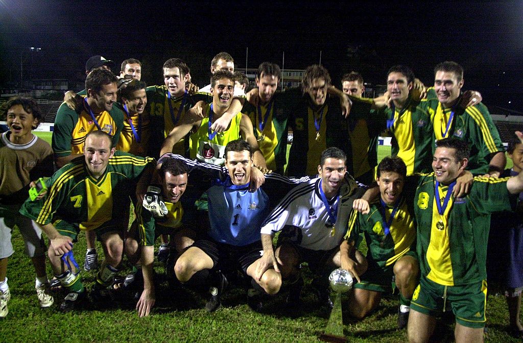The Socceroos celebrate after claiming the 2000 Oceania Cup