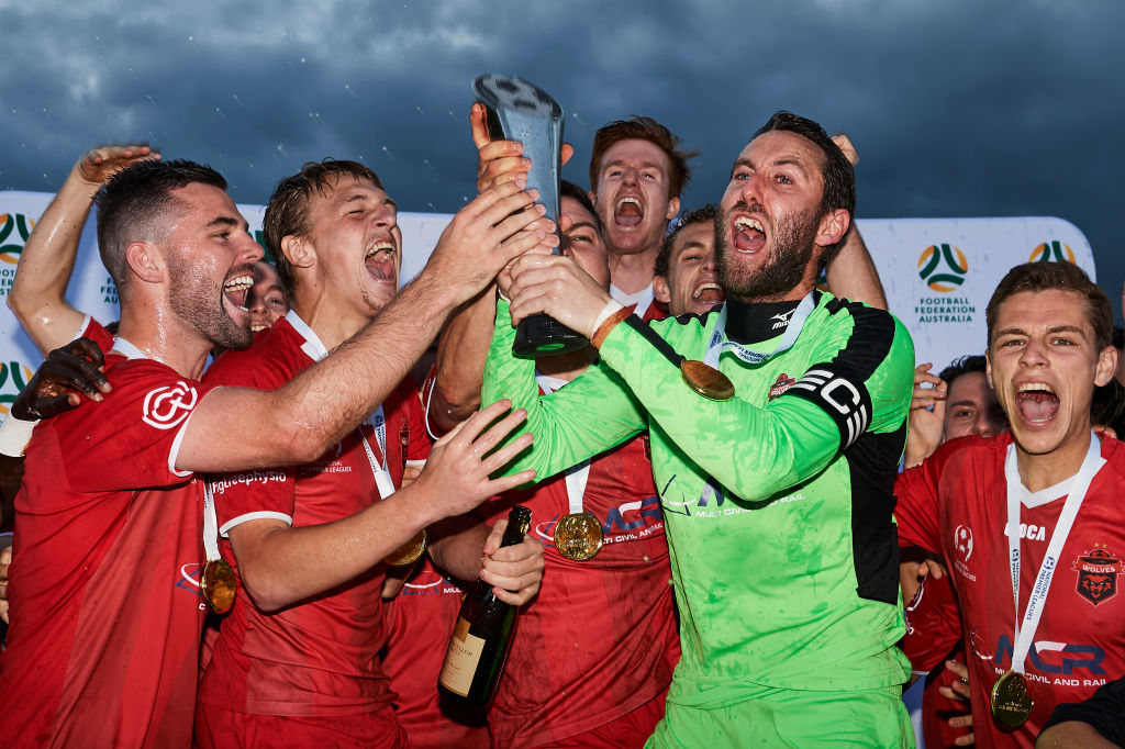 Wollongong Wolves celebrate after winning the 2019 NPL Final Series.
