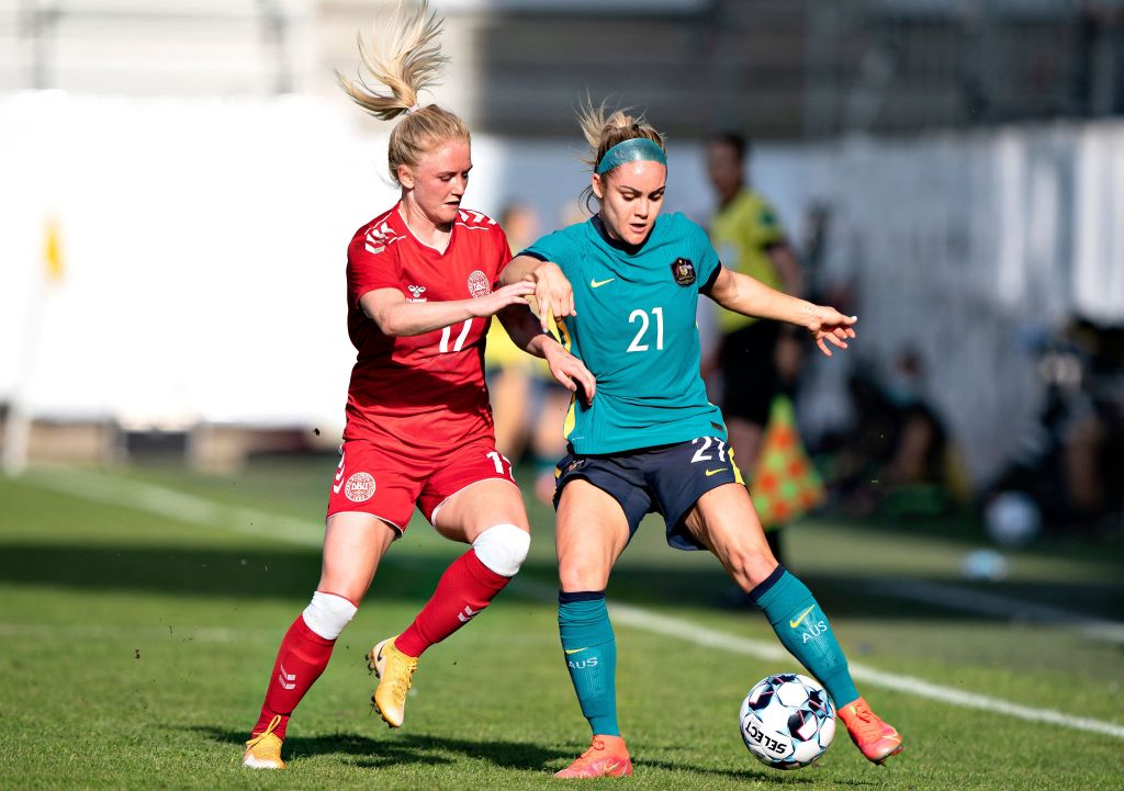 Ellie Carpenter battles for the ball v Denmark 