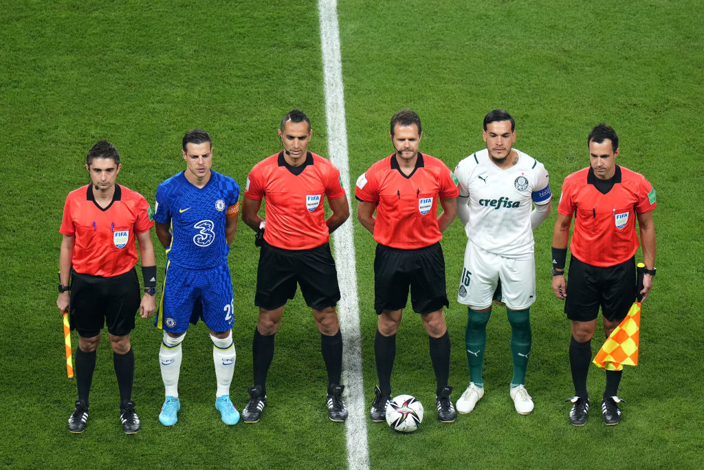 Referee Chris Beath poses for a photo with match officials Ashley Beecham, Anton Shchetinin, Mustapha Ghorbal and Cesar Azpilicueta of Chelsea and Gustavo Gomez of Palmeiras prior to the FIFA Club World Cup UAE 2021 Final match between Chelsea and Palmeiras at Mohammed Bin Zayed Stadium on February 12, 2022 in Abu Dhabi, United Arab Emirates. (Photo by Angel Martinez - FIFA/FIFA via Getty Images)