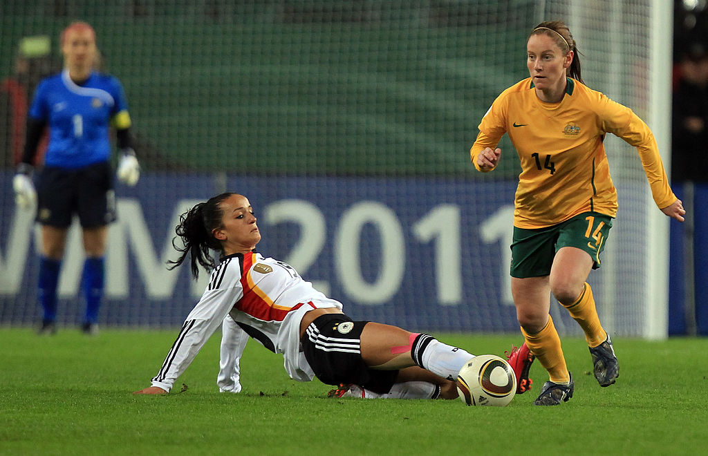 Fatmire Bajramaj (L) of Germany and of Collette McCallum (R) of Australia battle for the ball during the women's international friendly match between Germnay and Australia at Volkswagen Arena on October 28, 2010 in Wolfsburg, Germnay. (Photo by Martin Rose/Bongarts/Getty Images)