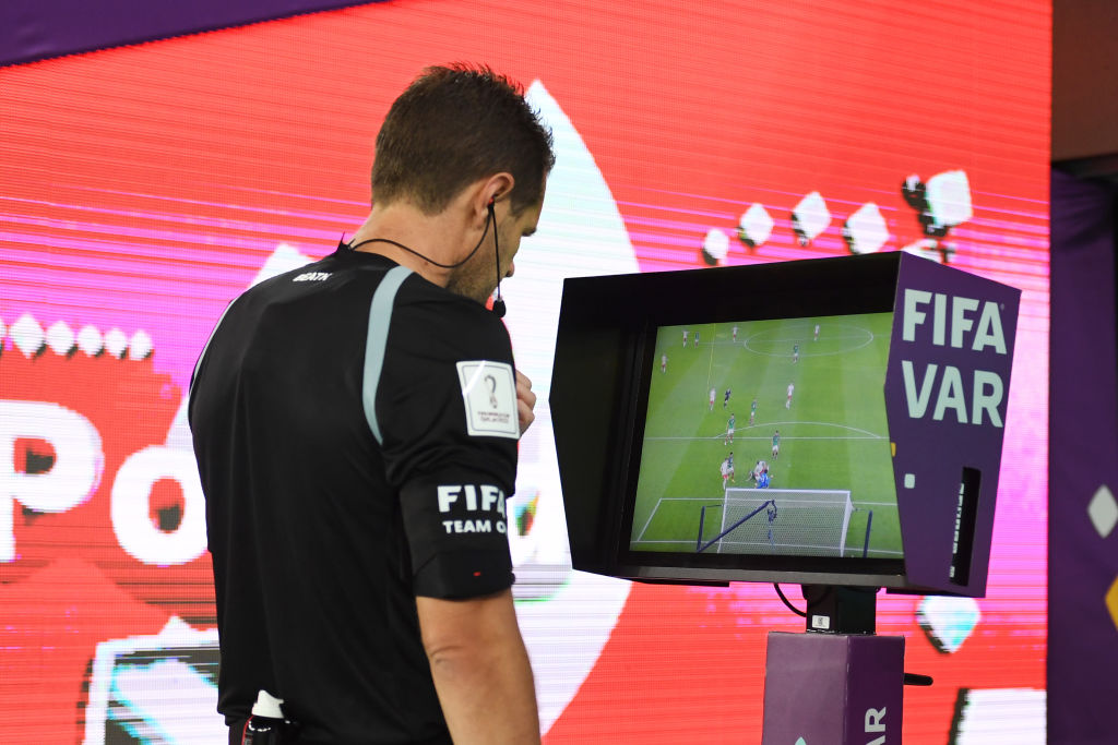Referee Chris Beath watches the Video Assistant Referee screen to review the penalty incident during the FIFA World Cup Qatar 2022 Group C match between Mexico and Poland at Stadium 974 on November 22, 2022 in Doha, Qatar. (Photo by David Ramos - FIFA/FIFA via Getty Images)