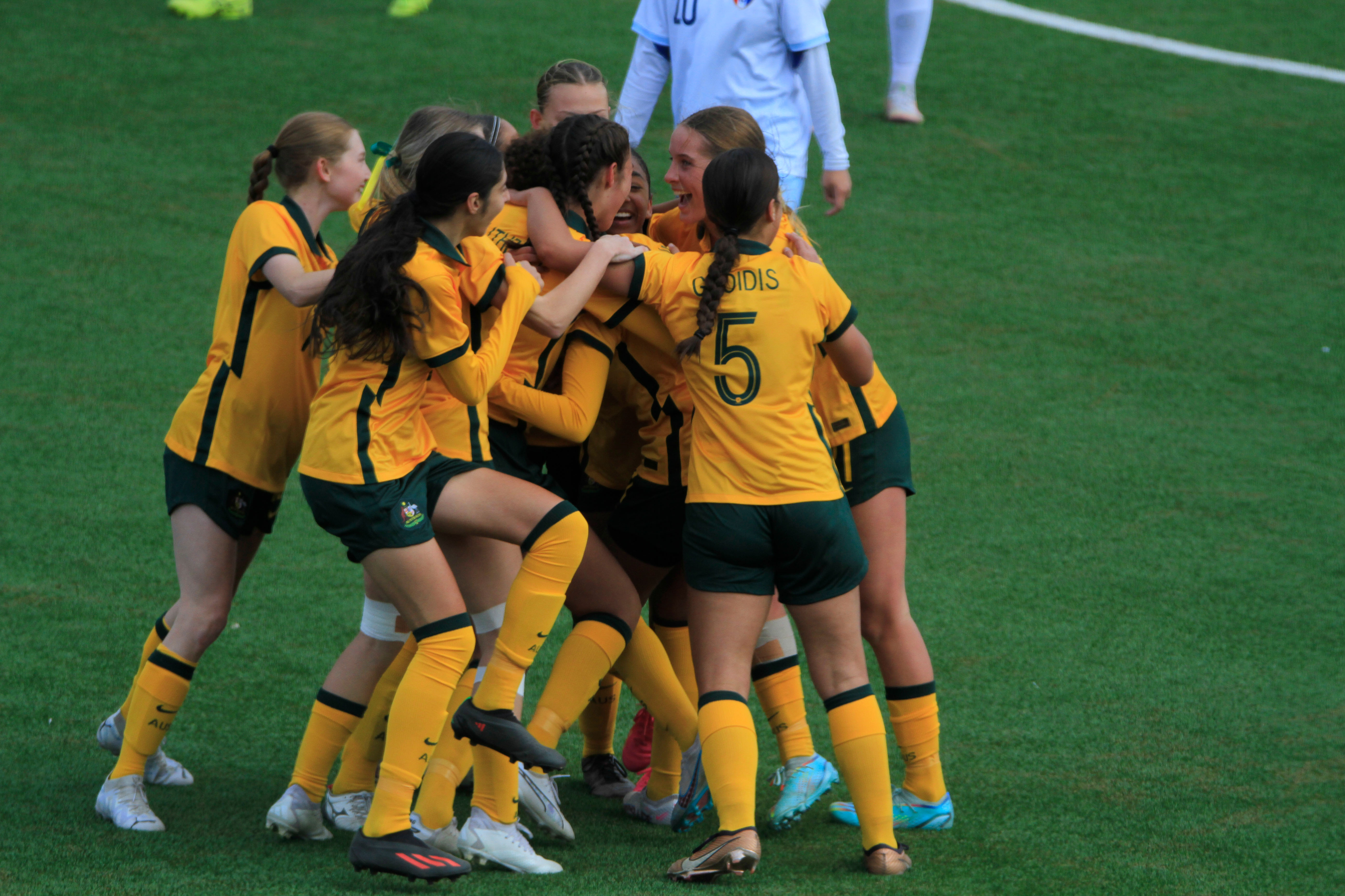 The CommBank Junior Matildas celebrating a goal against Chinese Taipei during Round 1 of qualifying.