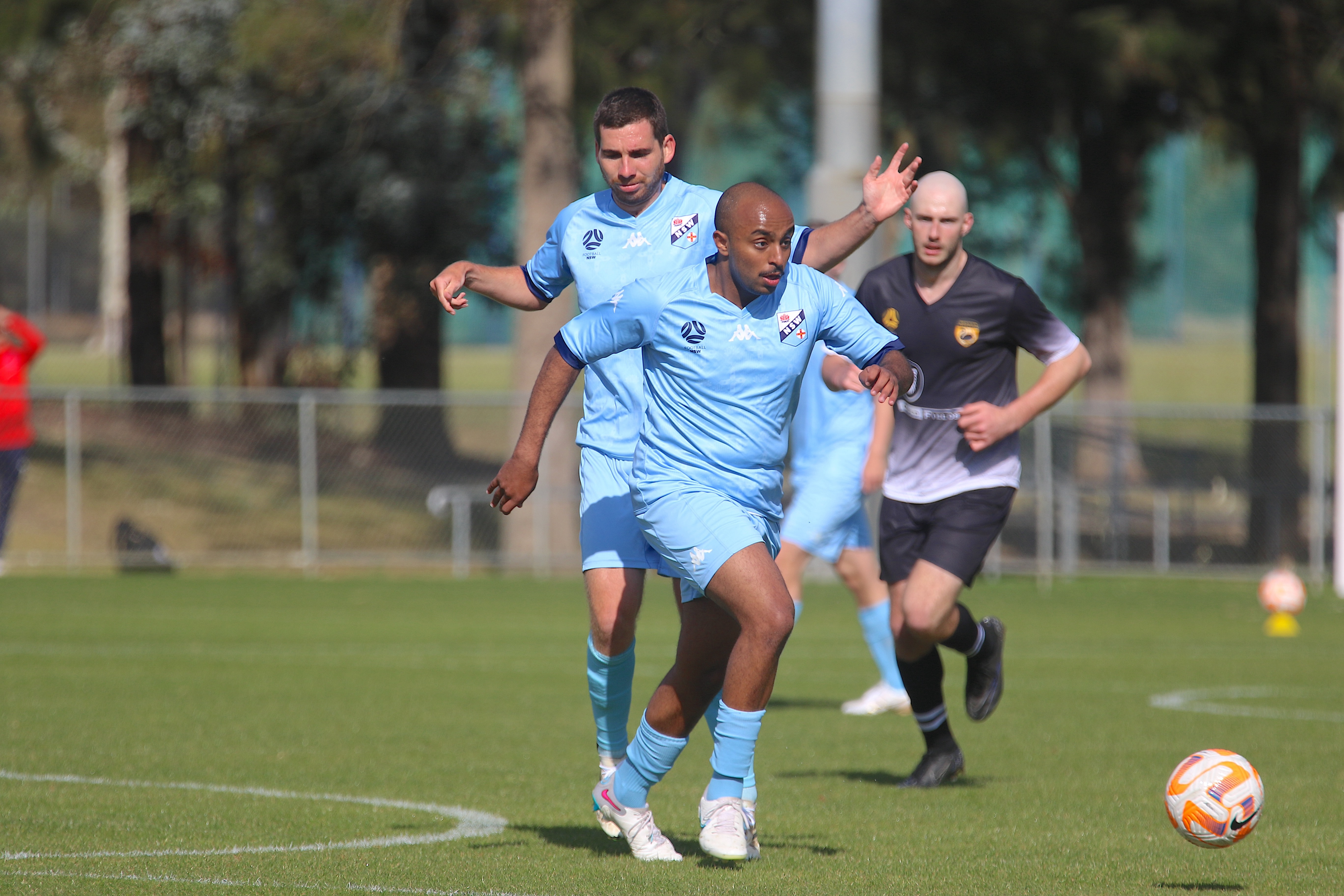 CommBank Pararoo Daniel Campbell powers through the line for Football NSW