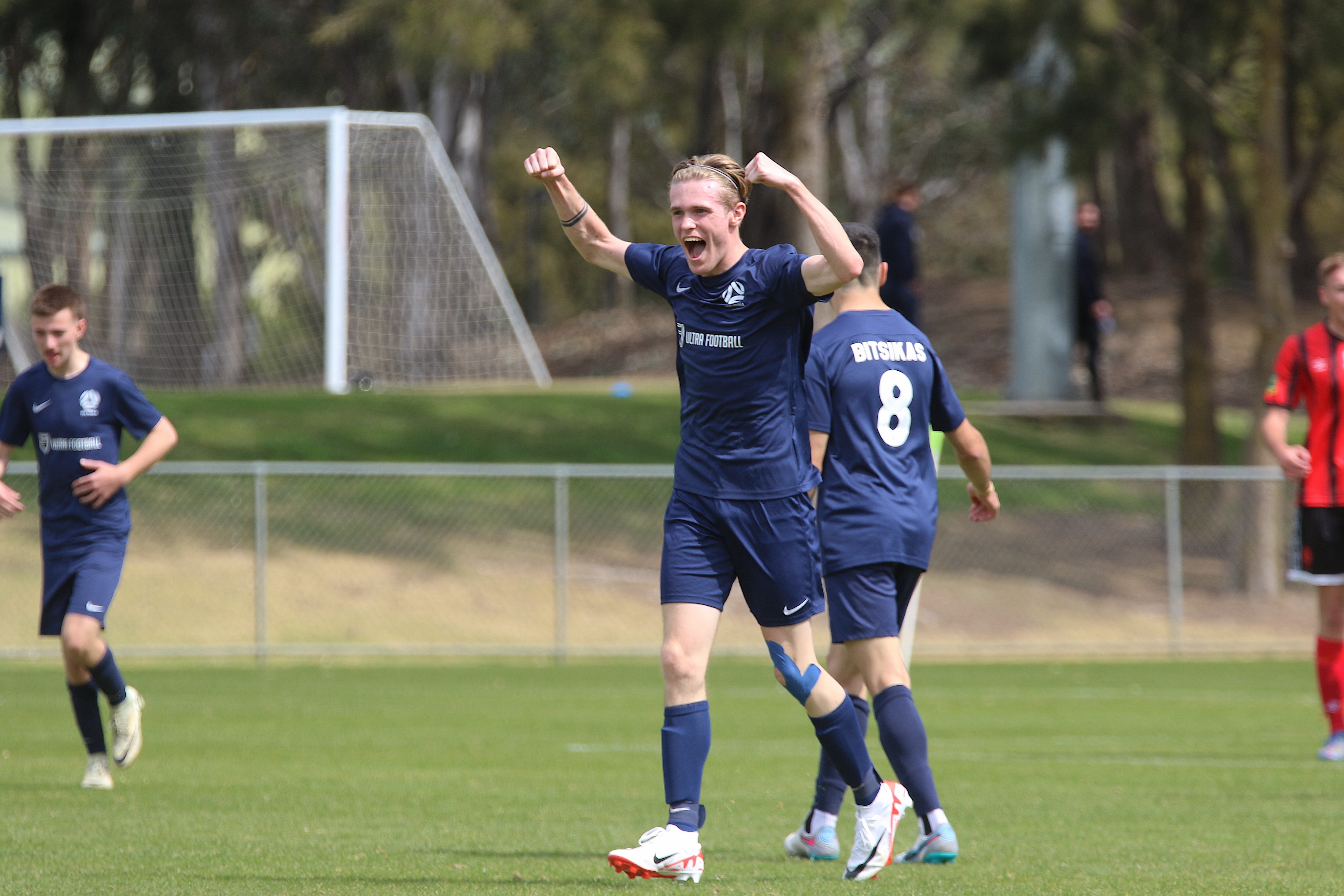 Football Victoria's Joshua Beekes celebrates scoring one of his three goals agianst Northern NSW