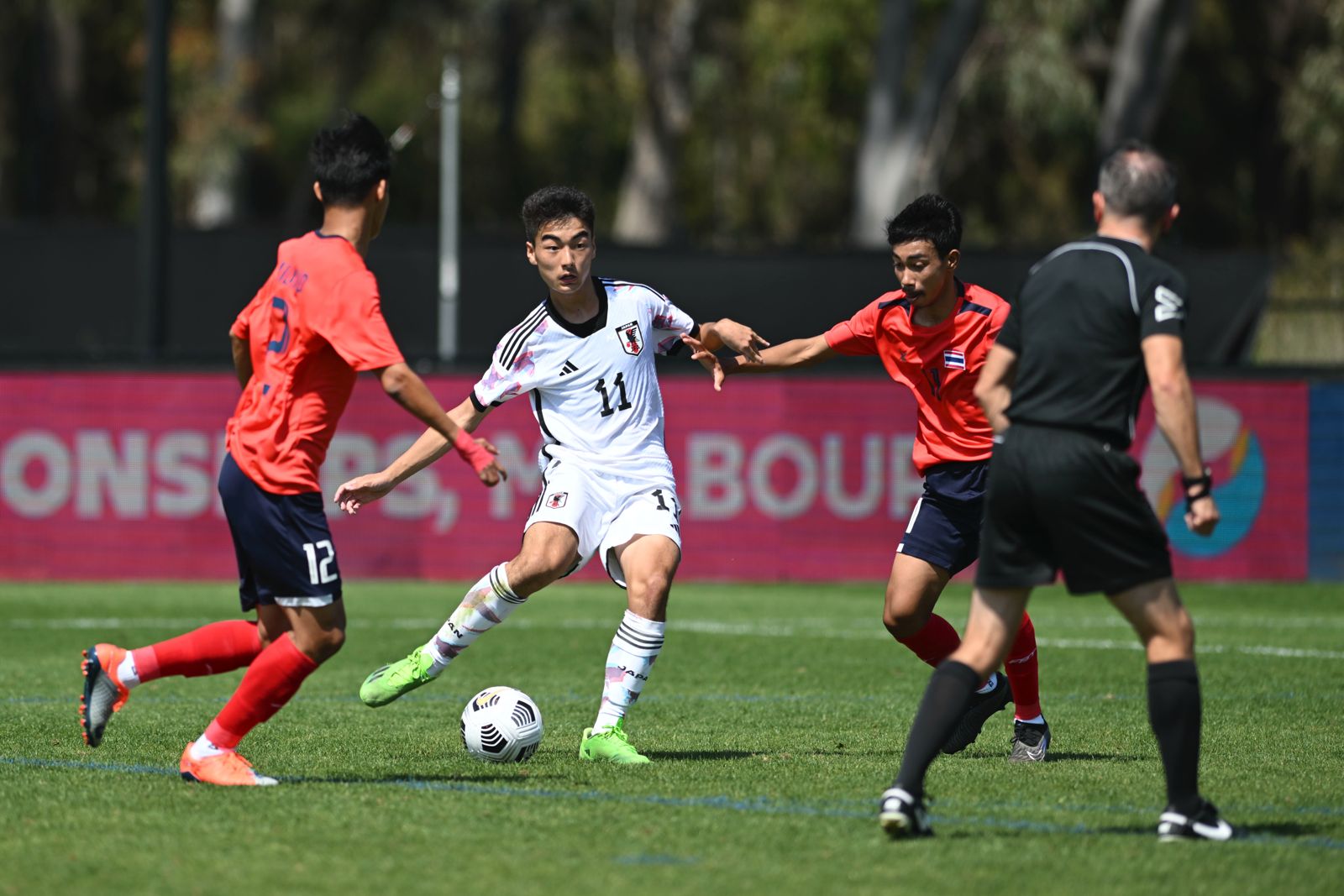 Hiroto Kageyama of Japan looks to find a pass in the IFCPF Asia Oceania Championships game against Thailand